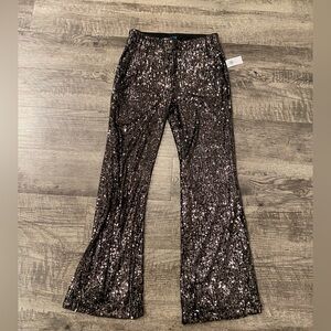 Black sequin pants brand new with tags. Small petite. Old navy
